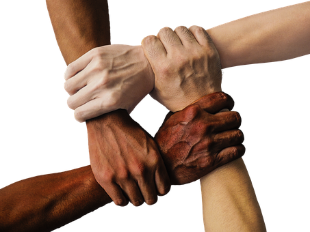 Four hands grasping wrists to form a square